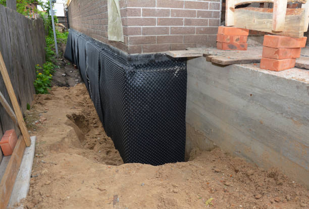 Happy homeowners after waterproofing job in Gillett